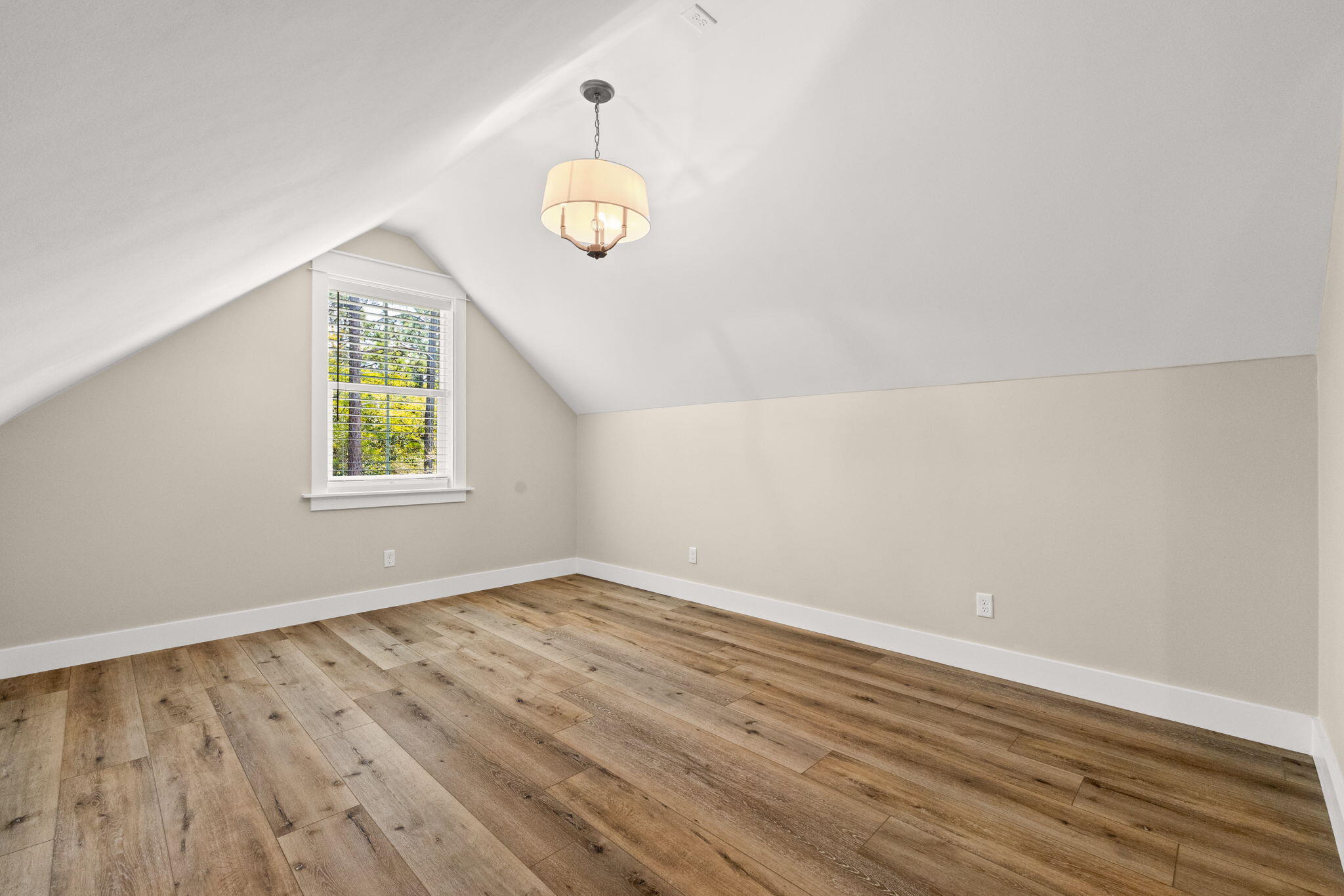 102 Churchill Drive Santa Rosa Beach, FL 32459 - Photo 71 of 89 an empty room with wooden floor and windows
