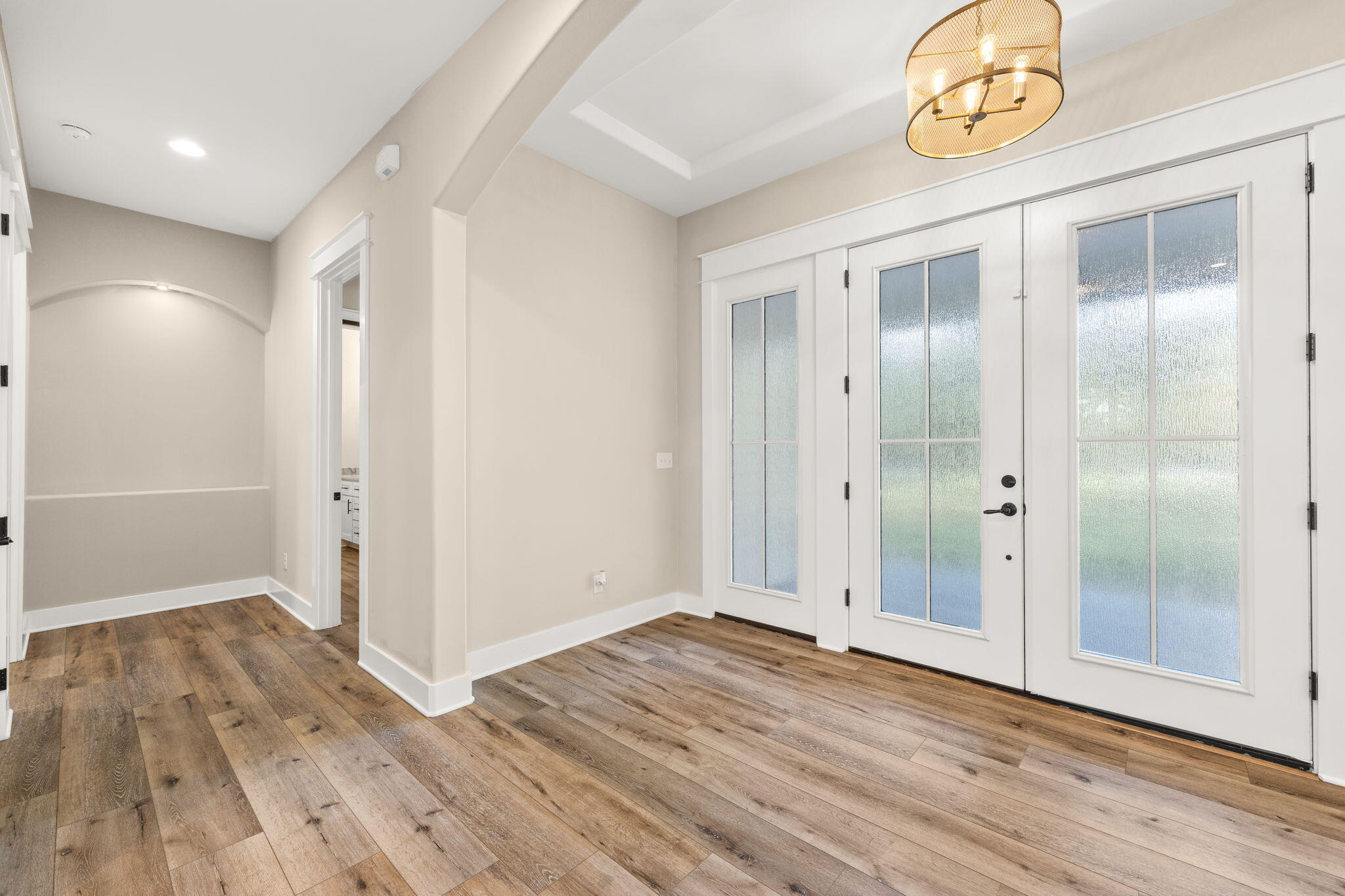 102 Churchill Drive Santa Rosa Beach, FL 32459 - Photo 86 of 89 a view of an empty room with wooden floor
