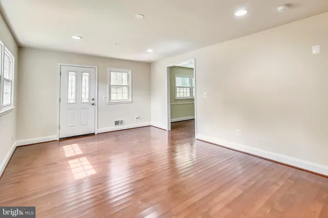 an empty room with windows