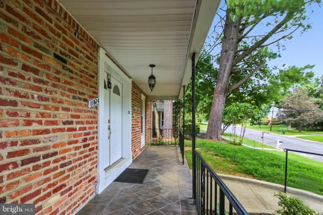 a view of an empty room with stairs
