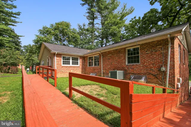 a front view of a house with patio