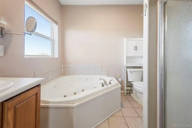 a bathroom with a bathtub and a sink