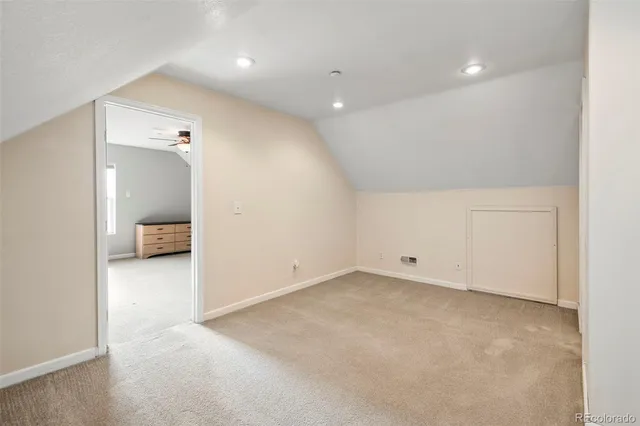 an empty room with a bathroom