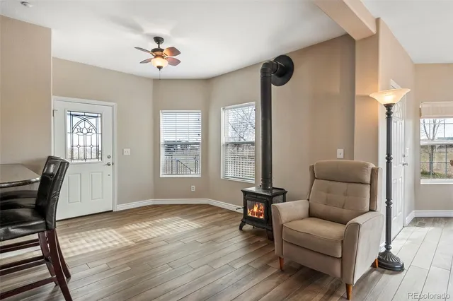 a living room with furniture and a window