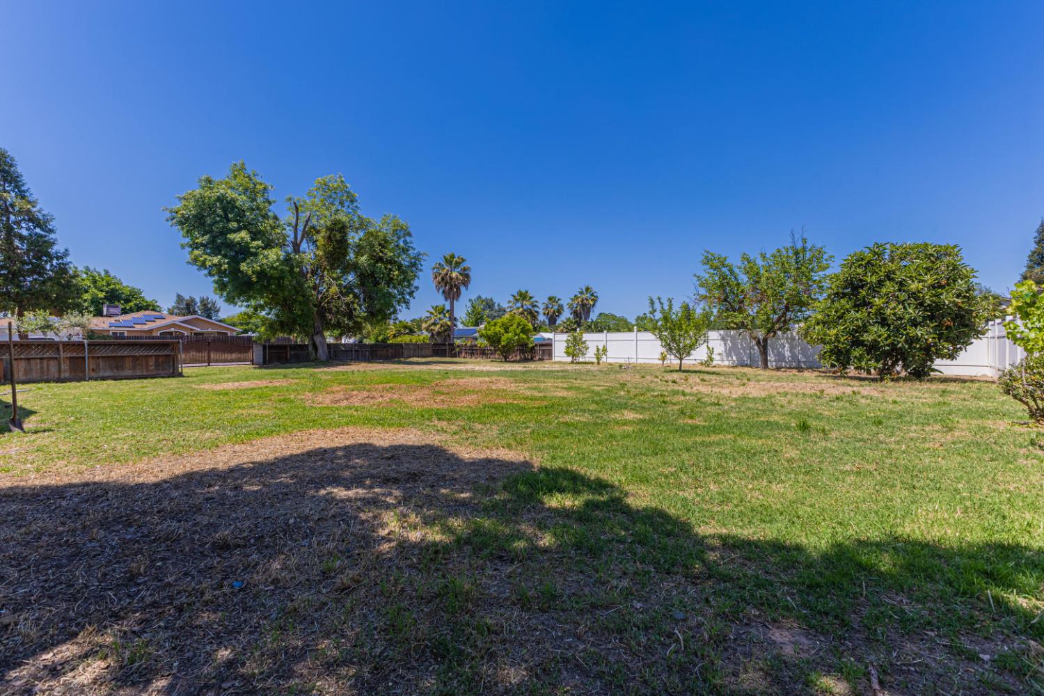 17925 Rodeo Drive Madera, CA 93638 - Photo 25 of 26 a view of a golf course with a lake
