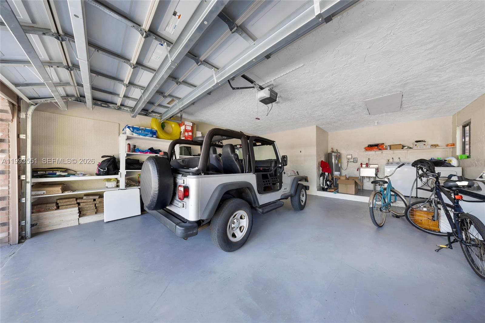 2752 Northeast 3rd Street Pompano Beach, FL 33062 - Photo 24 of 45 a view of parking garage with cars