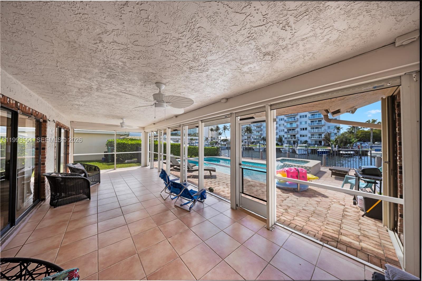 2752 Northeast 3rd Street Pompano Beach, FL 33062 - Photo 26 of 45 a very nice looking room with a large window and furniture