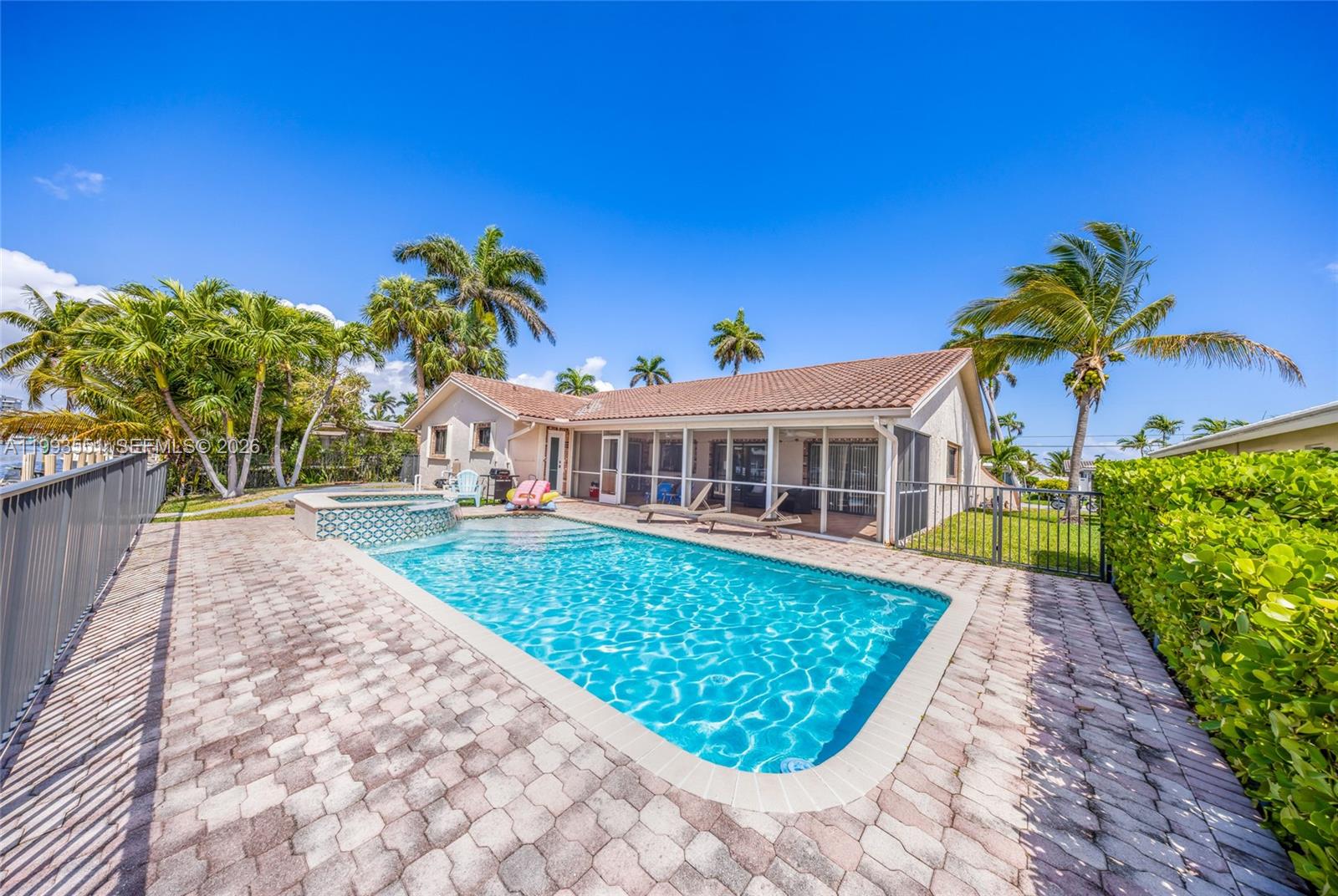 2752 Northeast 3rd Street Pompano Beach, FL 33062 - Photo 29 of 45 a view of a house with a yard