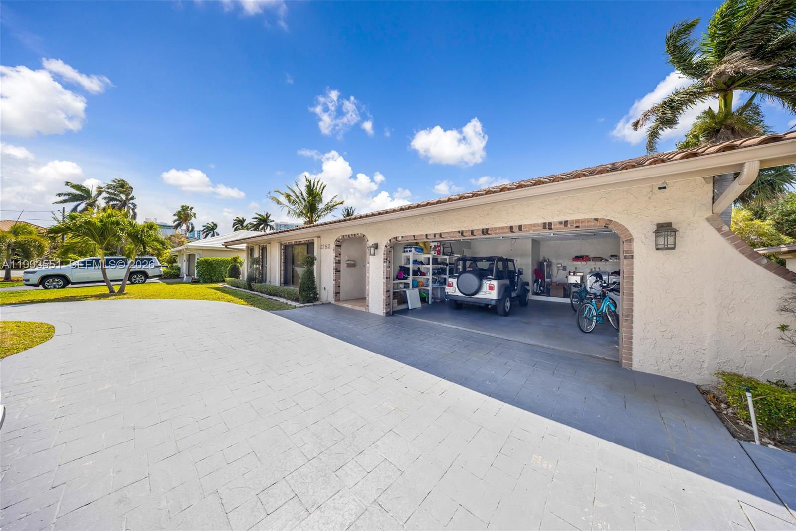 2752 Northeast 3rd Street Pompano Beach, FL 33062 - Photo 34 of 45 a view of a house with swimming pool and sitting area