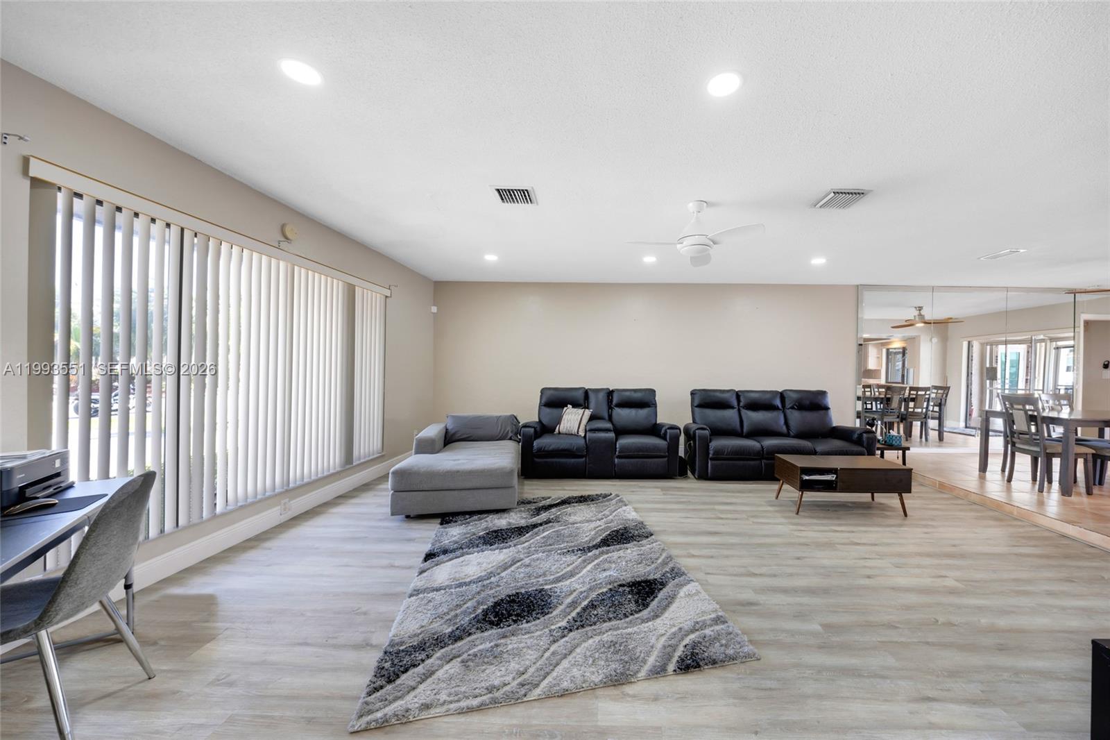 2752 Northeast 3rd Street Pompano Beach, FL 33062 - Photo 6 of 45 a living room with furniture and wooden floor