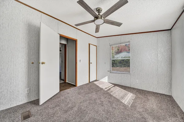 a view of an empty room and window