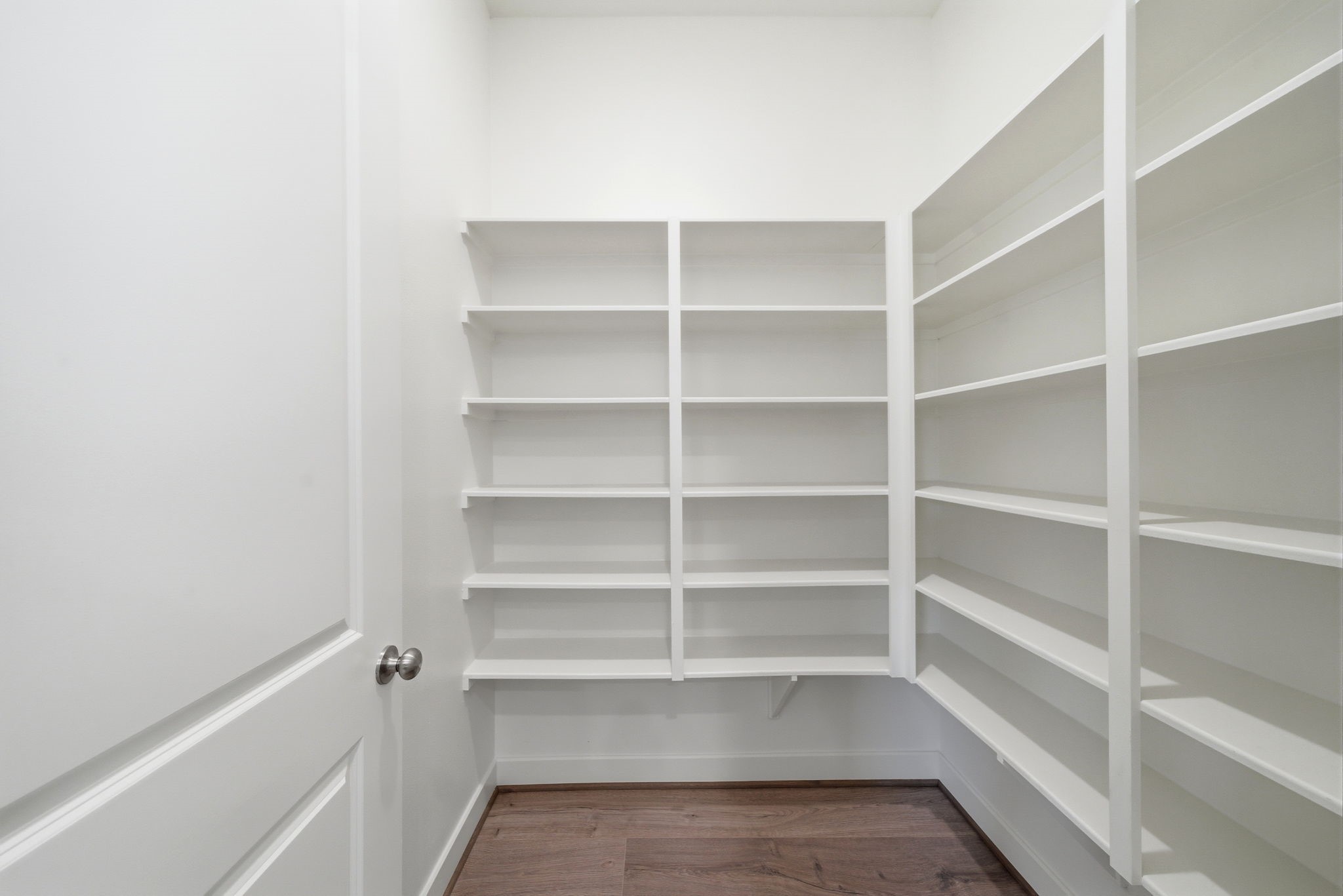 3073 Hicks Street Houston, TX 77007 - Photo 15 of 33 a view of walk in closet with empty racks