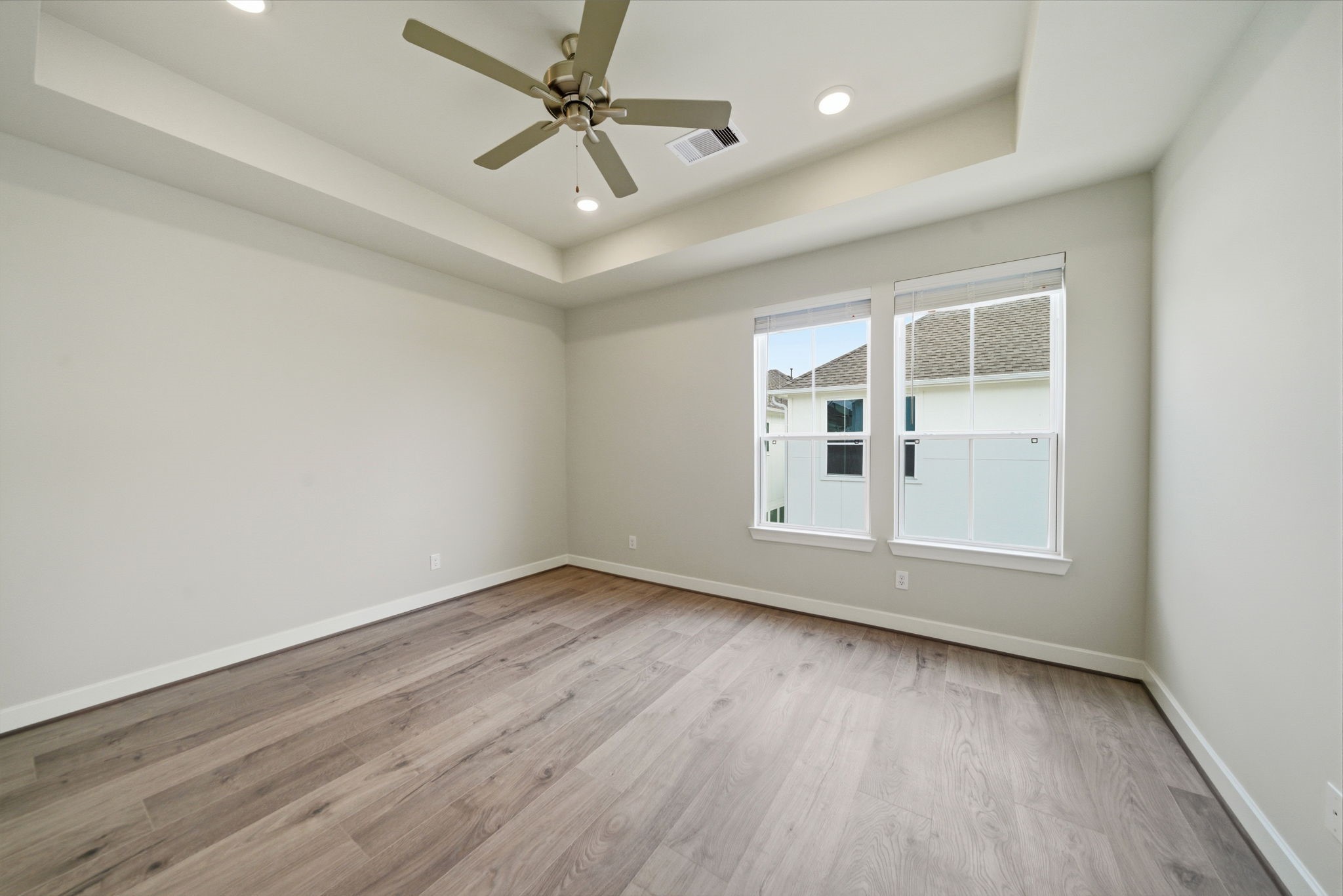 3073 Hicks Street Houston, TX 77007 - Photo 18 of 33 wooden floor in an empty room with a window