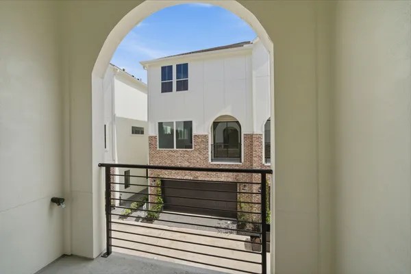 a spacious bathroom with a bathtub sink and toilet