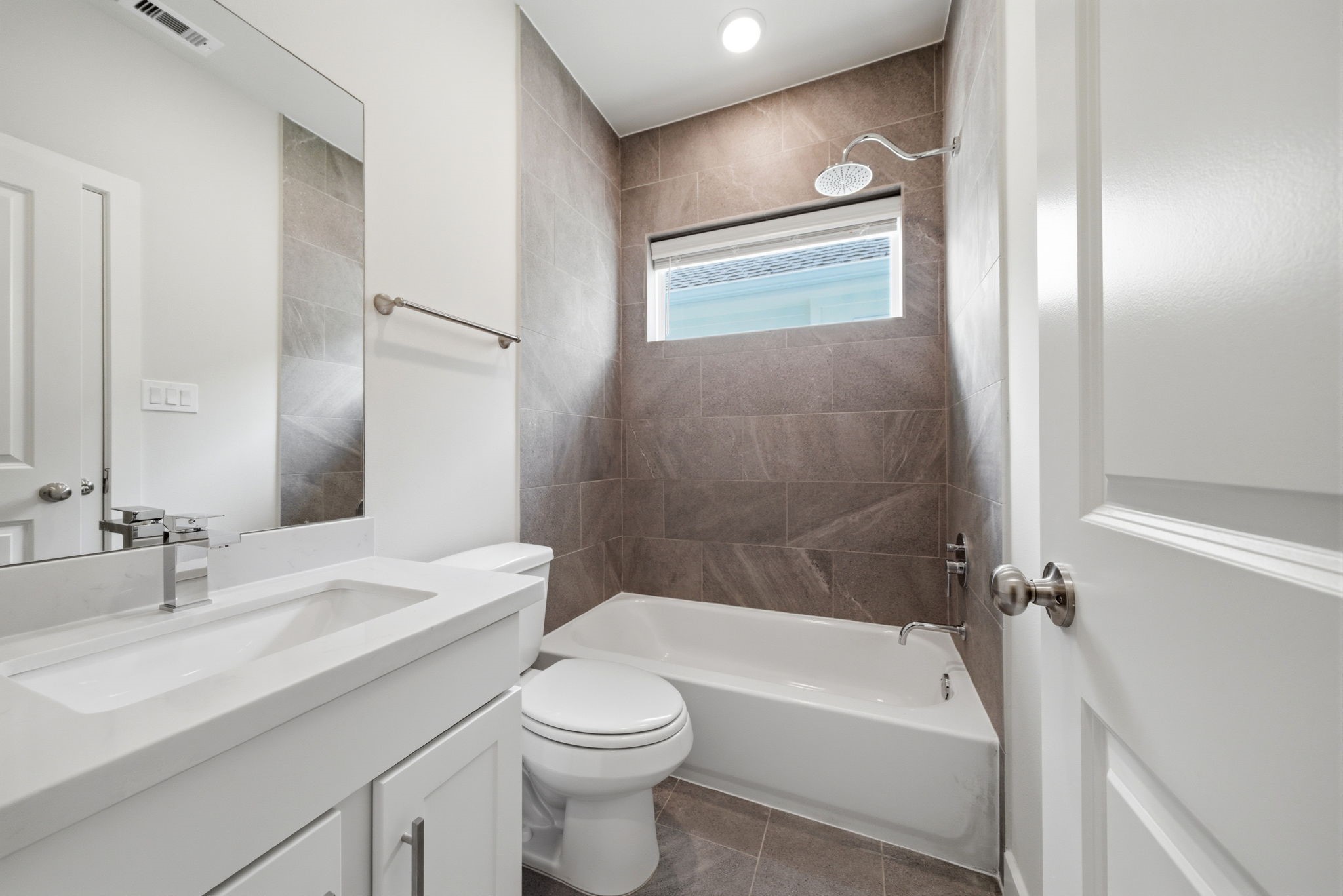 3073 Hicks Street Houston, TX 77007 - Photo 9 of 33 a bathroom with a sink a toilet and shower