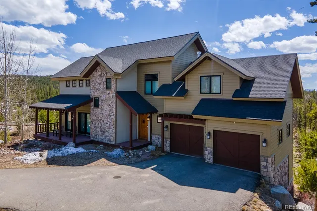 a front view of a house with yard