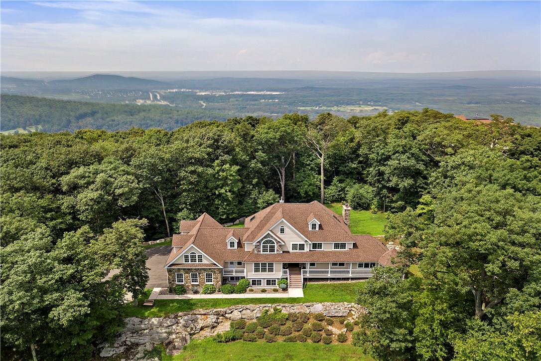 an aerial view of a house with a garden