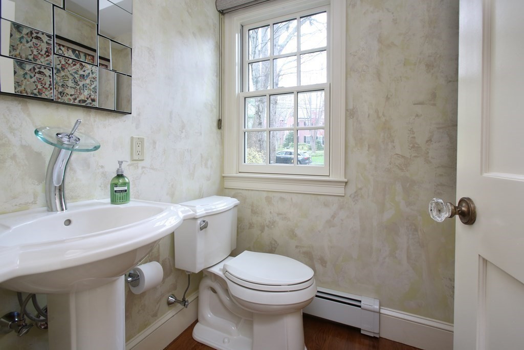 34 Greenwood Road Wellesley, MA 02481 - Photo 18 of 35 a bathroom with a sink a toilet and shower