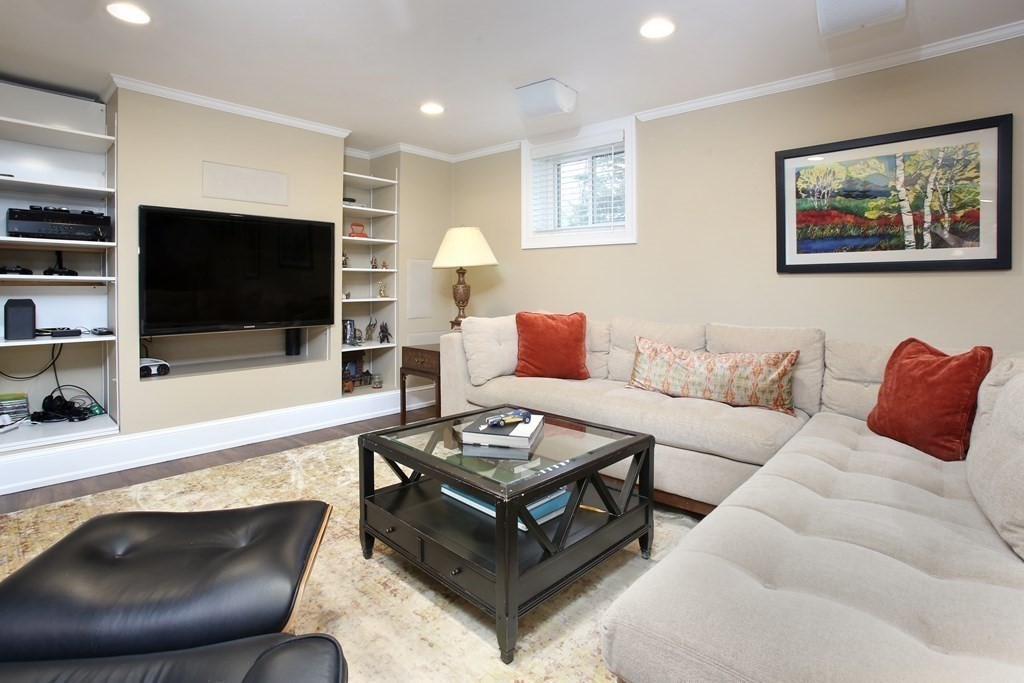 34 Greenwood Road Wellesley, MA 02481 - Photo 27 of 35 a living room with furniture and a flat screen tv