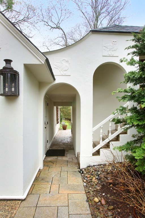 34 Greenwood Road Wellesley, MA 02481 - Photo 3 of 35 a front view of a house with a porch