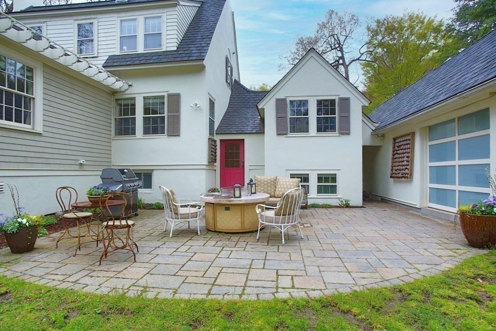 34 Greenwood Road Wellesley, MA 02481 - Photo 34 of 35 a front view of house with yard outdoor seating and barbeque oven