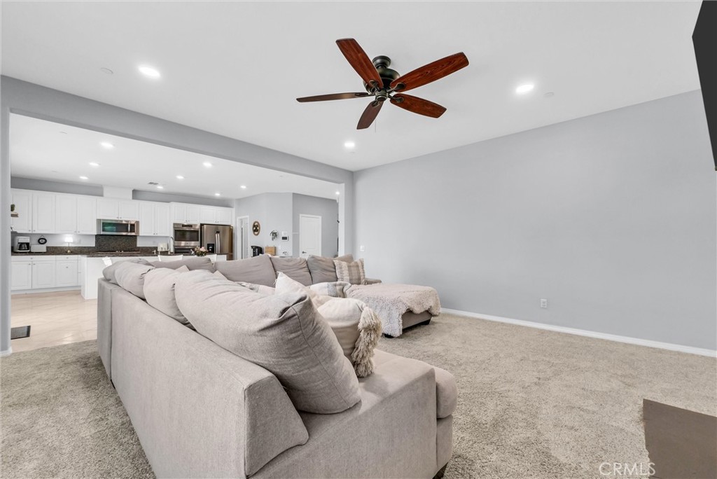 37656 Needlegrass Road Murrieta, CA 92563 - Photo 5 of 29 The view from the extra large family room towards the dining room.