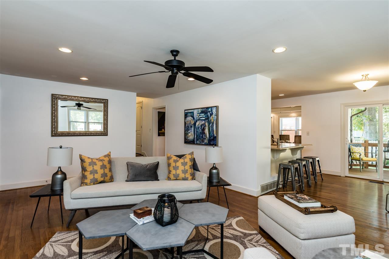 508 Banks Street Raleigh, NC 27604 - Photo 8 of 25 a living room with furniture and wooden floor