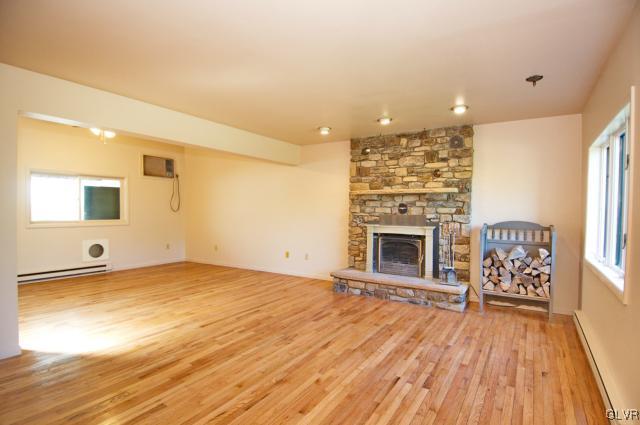 209 Valley View Road Riegelsville, PA 18077 - Photo 11 of 35 a view of a livingroom with a fireplace