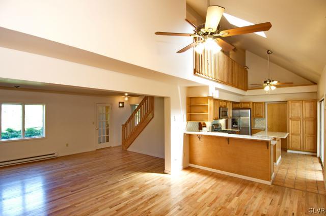 209 Valley View Road Riegelsville, PA 18077 - Photo 13 of 35 a view of a kitchen with furniture and wooden floor