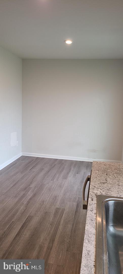 1047 Wickersham Way Middletown, DE 19709 - Photo 15 of 18 an empty room with wooden floor