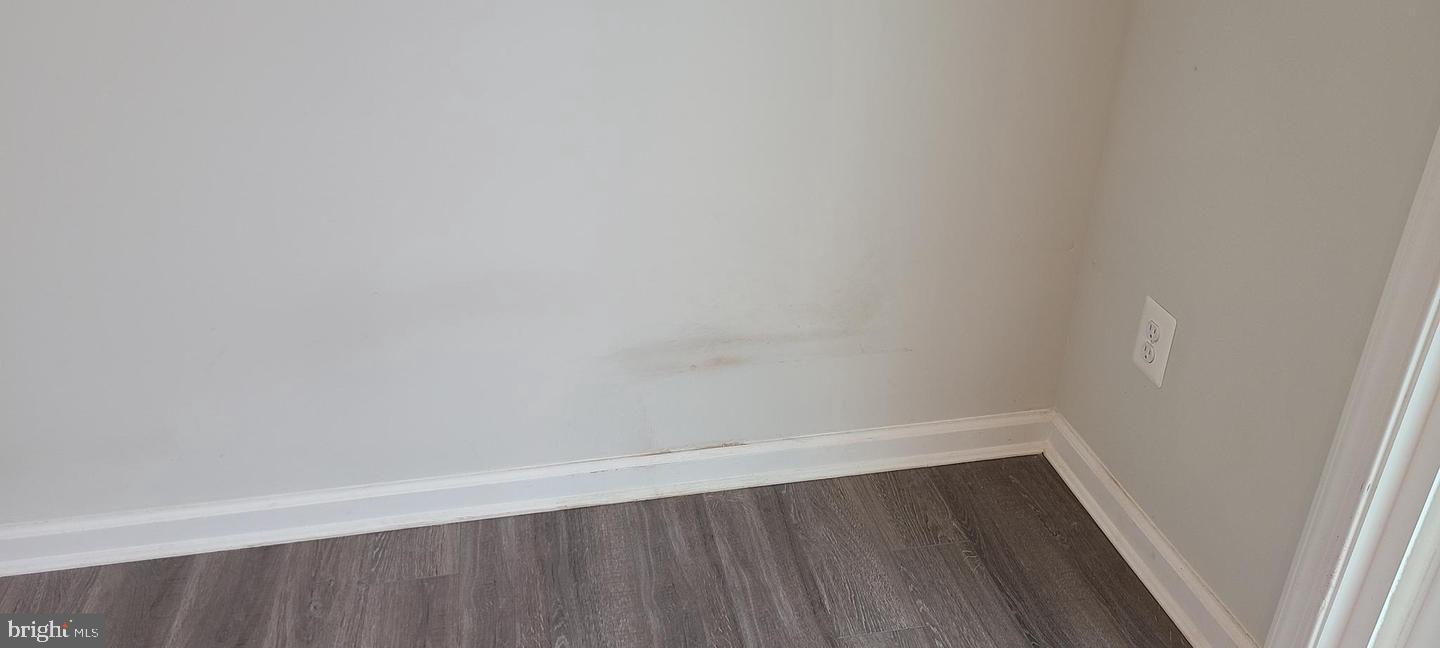 1047 Wickersham Way Middletown, DE 19709 - Photo 16 of 18 a view of wooden floor in a small shelf