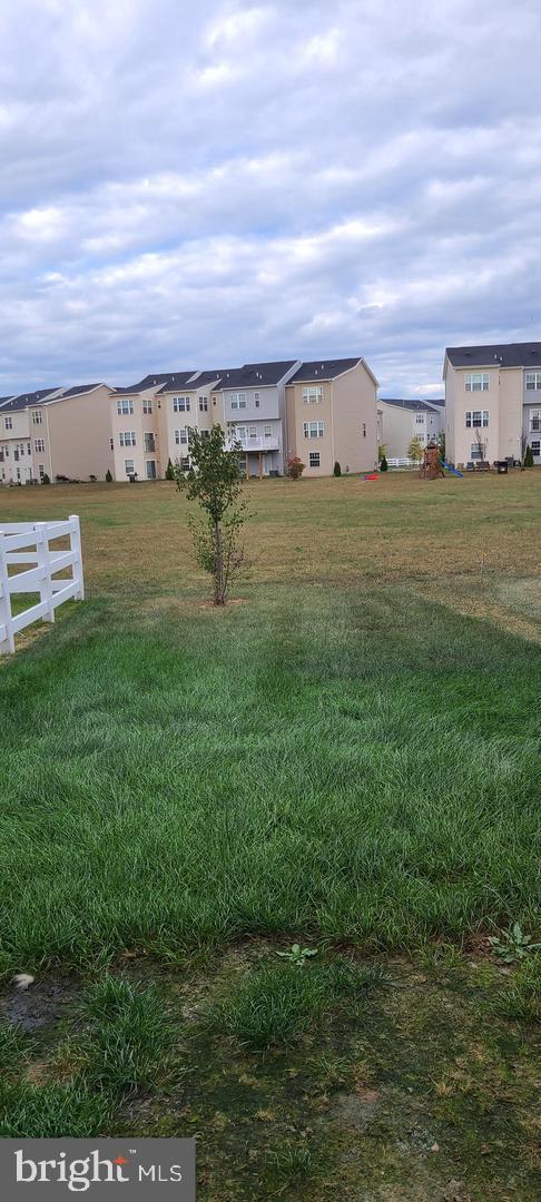 1047 Wickersham Way Middletown, DE 19709 - Photo 10 of 18 a view of building with ocean view