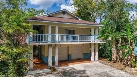 a front view of a house with a porch