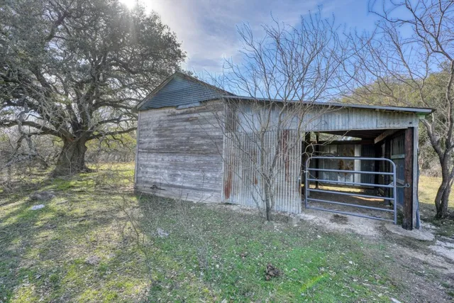 a view of outdoor space and wooden deck