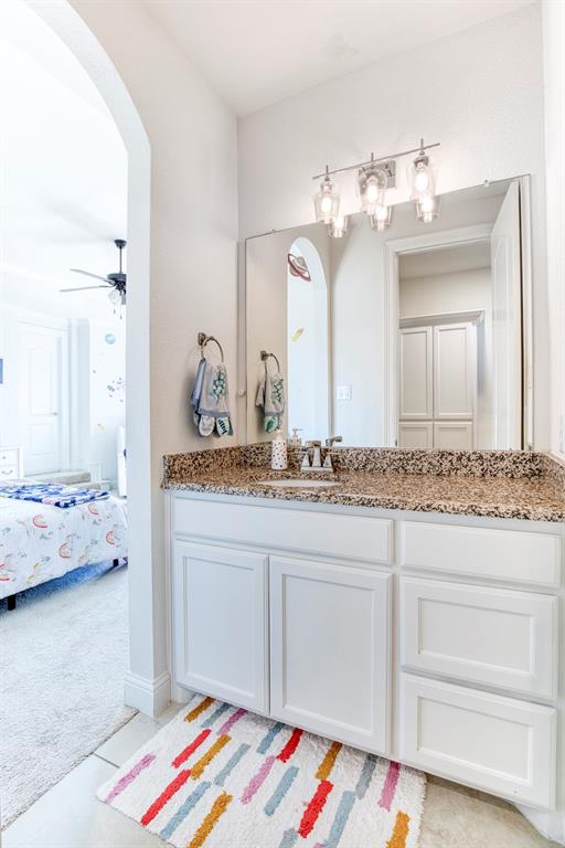 901 Inverness Court Lucas, TX 75002 - Photo 31 of 40 Bathroom with vanity, light colored carpet, and connected bathroom