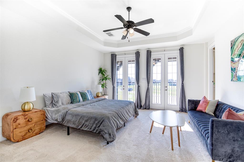 901 Inverness Court Lucas, TX 75002 - Photo 38 of 40 Bedroom with french doors, carpet, access to outside, crown molding, and ceiling fan