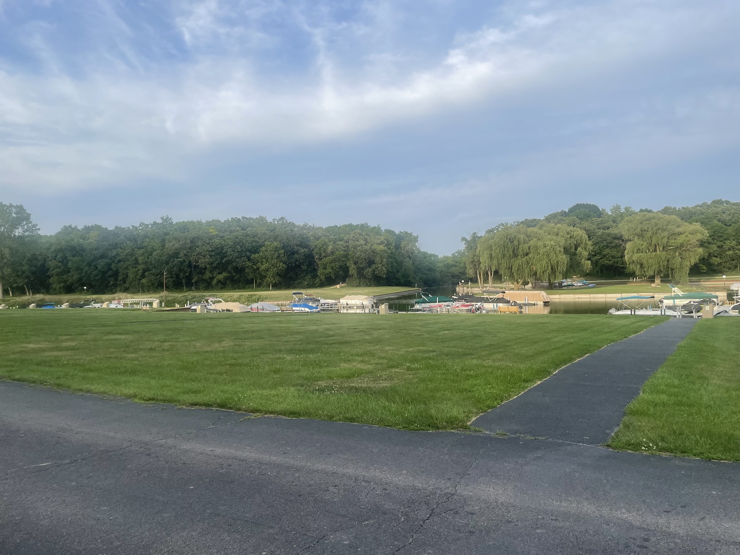 64 Aspen Colony, Unit 5 Fox Lake, IL 60020 - Photo 13 of 14 a view of a golf course with a lake