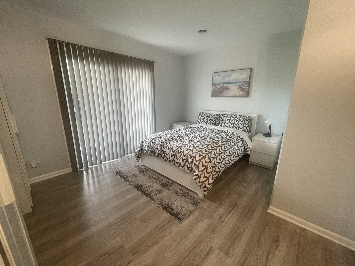 64 Aspen Colony, Unit 5 Fox Lake, IL 60020 - Photo 9 of 14 a bedroom with a bed and a window