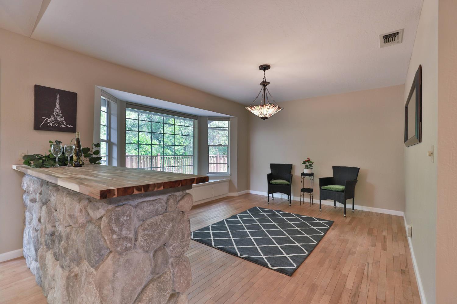 4773 Jacarah Road Placerville, CA 95667 - Photo 21 of 94 Formal dining has beautiful bay windows.