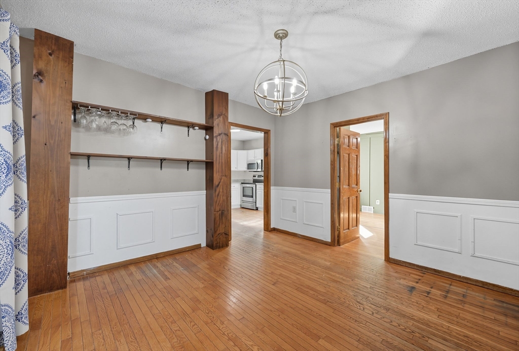 72 Highland Avenue Ludlow, MA 01056 - Photo 14 of 32 a view of a room with wooden floor and window