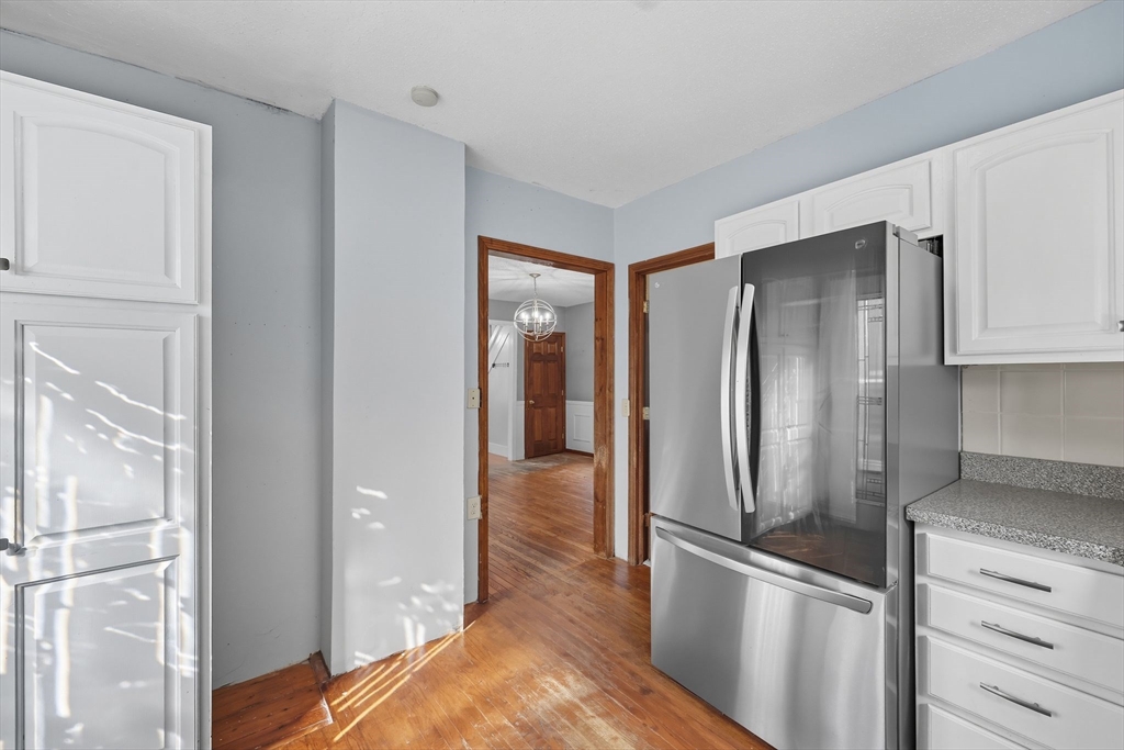 72 Highland Avenue Ludlow, MA 01056 - Photo 17 of 32 a kitchen with stainless steel appliances granite countertop a refrigerator and a stove