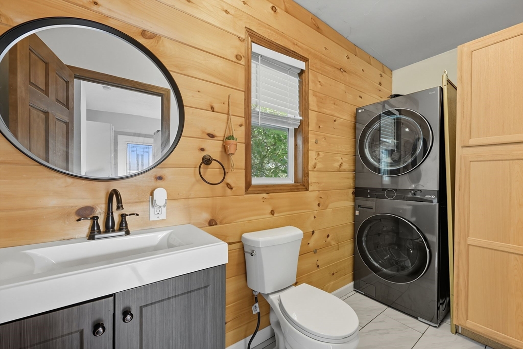 72 Highland Avenue Ludlow, MA 01056 - Photo 20 of 32 a bathroom with a toilet a sink and a mirror