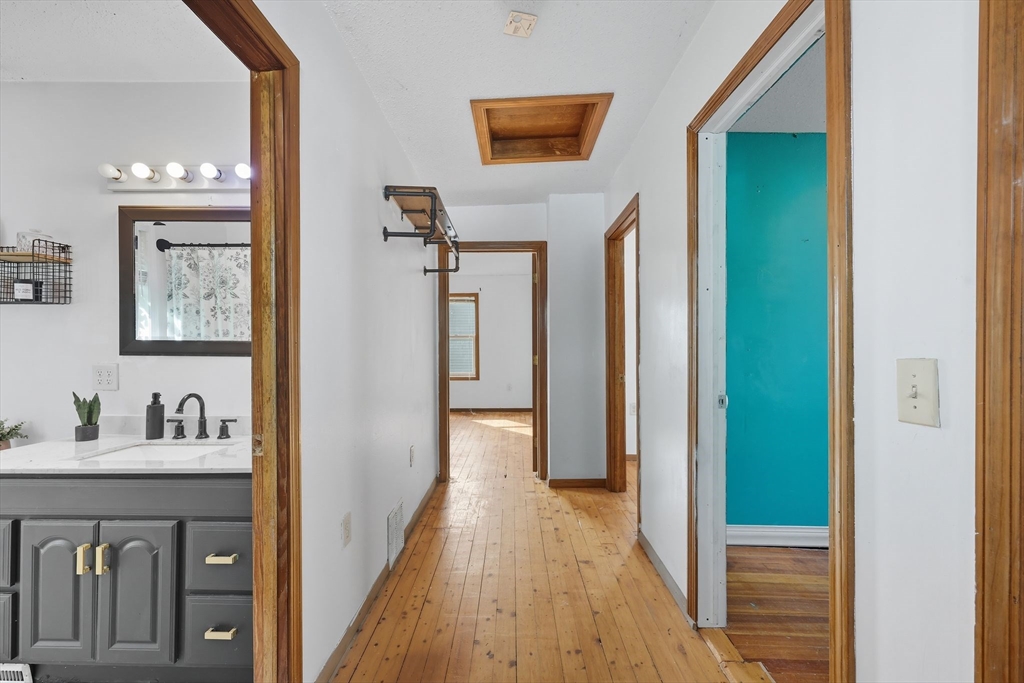 72 Highland Avenue Ludlow, MA 01056 - Photo 22 of 32 a view of a bathroom from the hallway