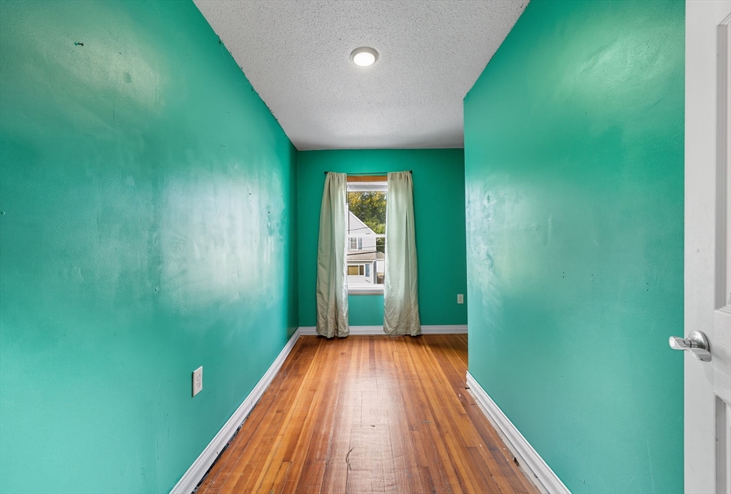 72 Highland Avenue Ludlow, MA 01056 - Photo 23 of 32 a view of a backyard with a garden
