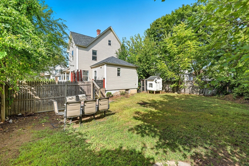 72 Highland Avenue Ludlow, MA 01056 - Photo 31 of 32 a view of a house with a yard and sitting area