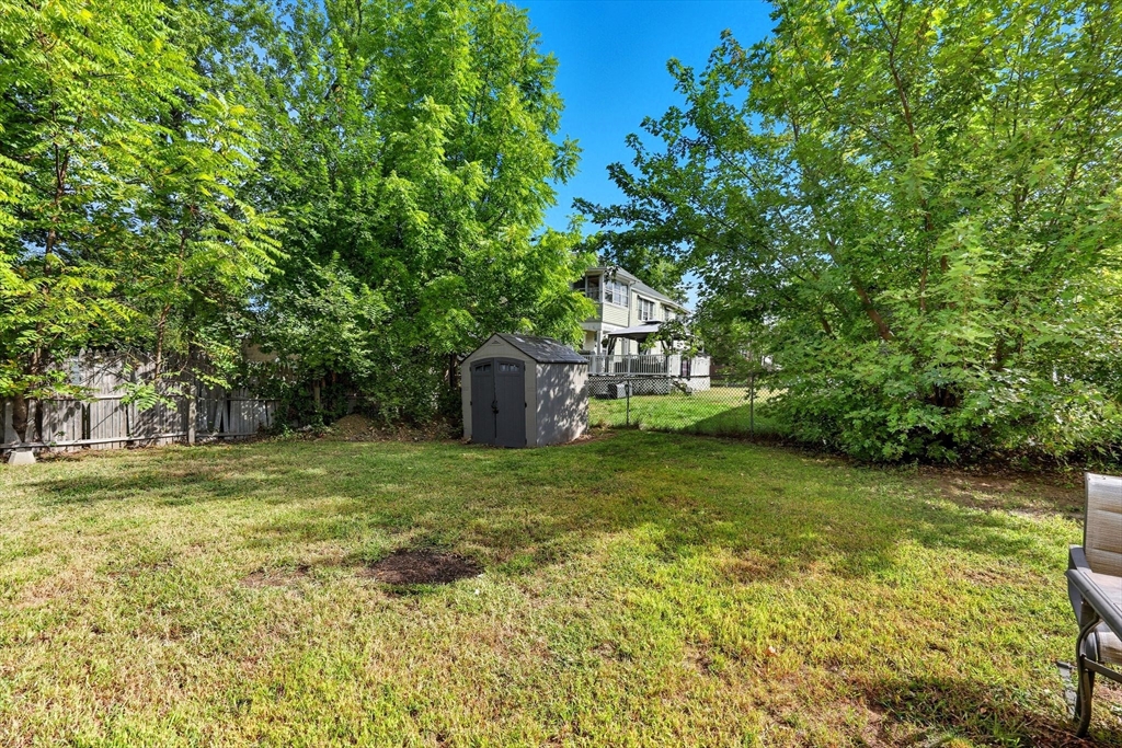 72 Highland Avenue Ludlow, MA 01056 - Photo 32 of 32 a fire hydrant in the middle of a field