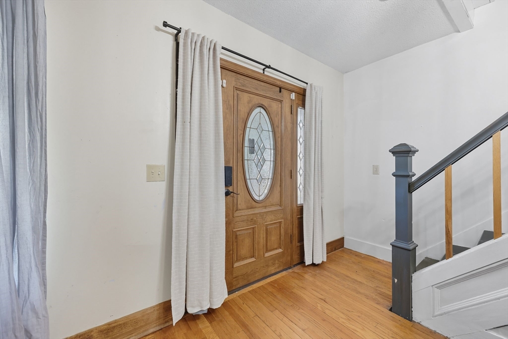 72 Highland Avenue Ludlow, MA 01056 - Photo 7 of 32 a view of front door with wooden floor