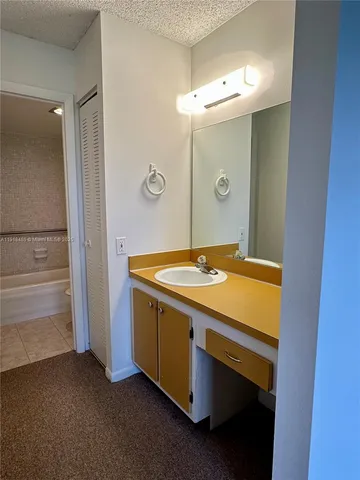 a room with a wooden floor and a table