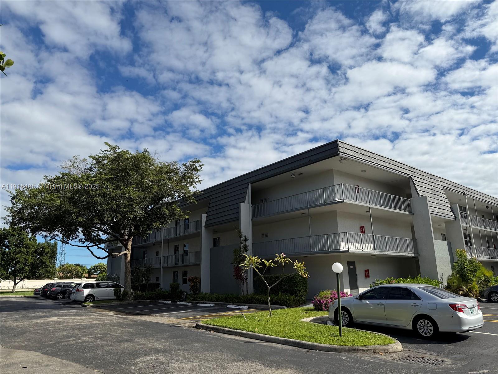 9101 Lime Bay Boulevard, Unit 302 Tamarac, FL 33321 - Photo 27 of 34 a building view