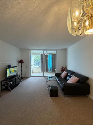 $100,000 | 9101 Lime Bay Boulevard, Unit 302, Tamarac, FL 33321